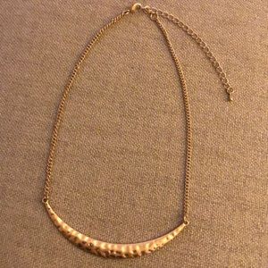 Soft gold curved bar necklace